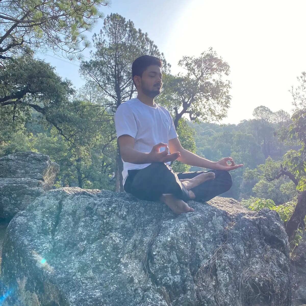 Manish, founder and lead instructor of Veda Yoga Studio, speaking at an International Yoga Day event